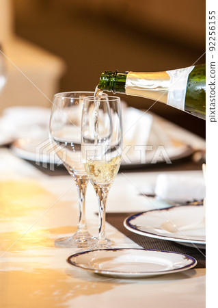 Image of champagne serve with gloves and hygiene at the wedding venue Image of champagne serve with gloves and hygiene at the wedding venue 92256155