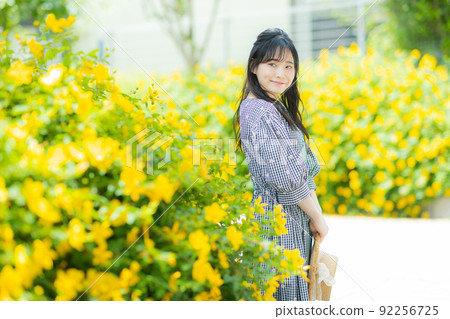 Female yellow flower Female yellow flower 92256725