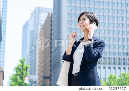 Female business commuting office business woman Female business commuting office business woman 92257337