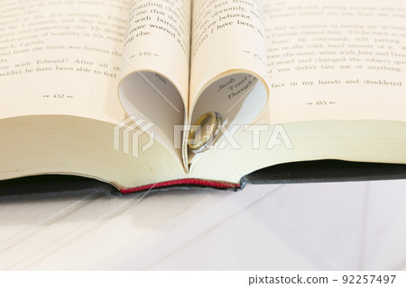Wedding ring and Bible image 92257497