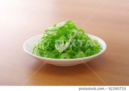 Green onions cut into small pieces Green onions cut into small pieces 92260710