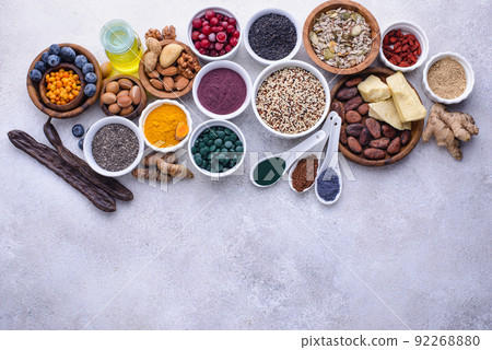Various superfoods and healthy food supplement. 92268880