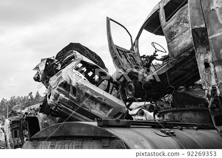 Black and white photo of the war in Ukraine - destroyed cars in Bucha district Black and white photo of the war in Ukraine - destroyed cars in Bucha district 92269353