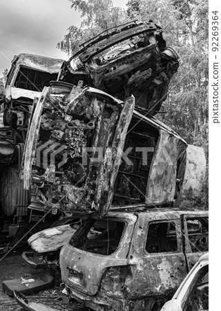 Dump of war-destroyed cars in Ukraine, black and white photo Dump of war-destroyed cars in Ukraine, black and white photo 92269364