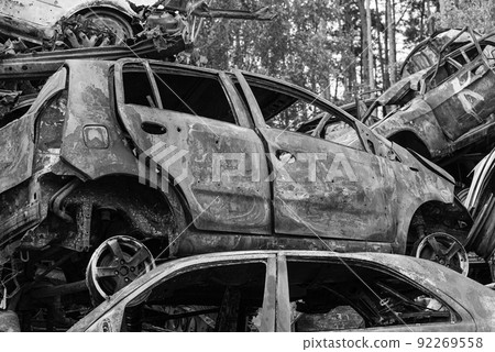 Dump of war-destroyed cars in Ukraine, black and white photo Dump of war-destroyed cars in Ukraine, black and white photo 92269558