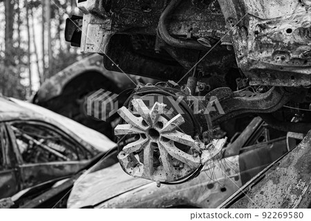Black and white photo of the war in Ukraine - destroyed cars in Bucha district Black and white photo of the war in Ukraine - destroyed cars in Bucha district 92269580