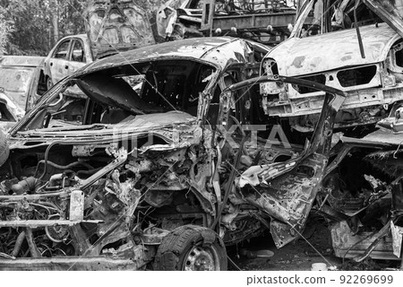 Dump of war-destroyed cars in Ukraine, black and white photo Dump of war-destroyed cars in Ukraine, black and white photo 92269699