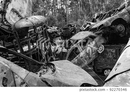 Dump of war-destroyed cars in Ukraine, black and white photo Dump of war-destroyed cars in Ukraine, black and white photo 92270346