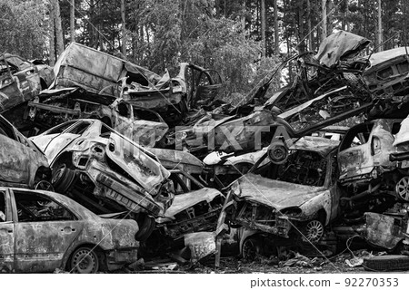 Black and white photo of the war in Ukraine - destroyed cars in Bucha district Black and white photo of the war in Ukraine - destroyed cars in Bucha district 92270353