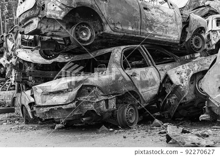 Dump of war-destroyed cars in Ukraine, black and white photo Dump of war-destroyed cars in Ukraine, black and white photo 92270627