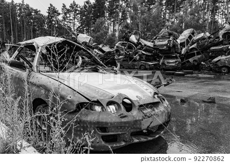 Dump of war-destroyed cars in Ukraine, black and white photo Dump of war-destroyed cars in Ukraine, black and white photo 92270862