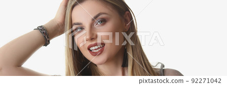 Beautiful stylish young blonde woman posing on white background in studio Beautiful stylish young blonde woman posing on white background in studio 92271042