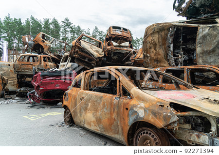 Shot and burned cars during the war in Ukraine 92271394