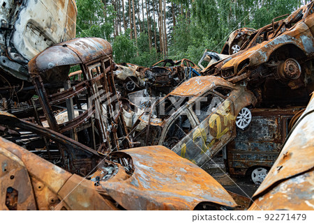 Shot and burned cars during the war in Ukraine Shot and burned cars during the war in Ukraine 92271479
