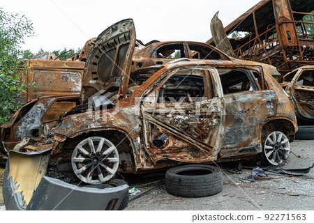 Dump of war-destroyed cars in Ukraine 92271563