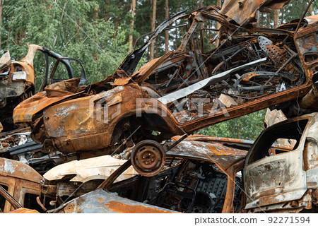 Irpin, Bucha district, Ukraine - war-destroyed cars Irpin, Bucha district, Ukraine - war-destroyed cars 92271594