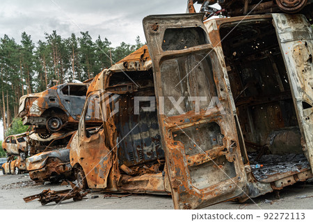 Shot and burned cars during the war in Ukraine 92272113