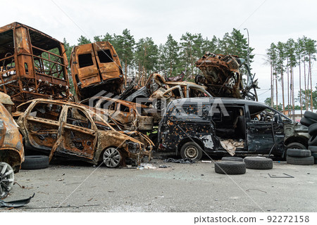 Shot and burned cars during the war in Ukraine Shot and burned cars during the war in Ukraine 92272158