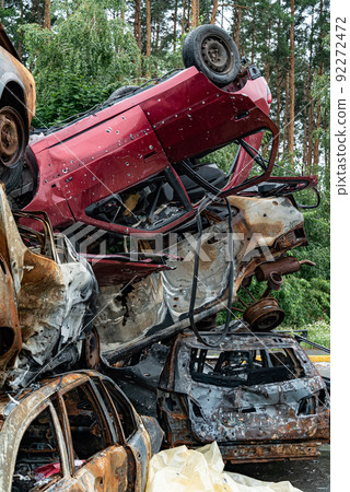 Irpin, Bucha district, Ukraine - war-destroyed cars Irpin, Bucha district, Ukraine - war-destroyed cars 92272472