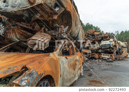 Consequences of the war in Ukraine - destroyed cars in Irpin, Bucha district. 92272493