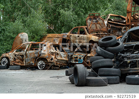 Irpin, Bucha district, Ukraine - war-destroyed cars Irpin, Bucha district, Ukraine - war-destroyed cars 92272519