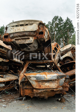 Shot and burned cars during the war in Ukraine Shot and burned cars during the war in Ukraine 92272538