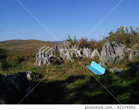 The earth in the mountains and the blue bench The earth in the mountains and the blue bench 92274902