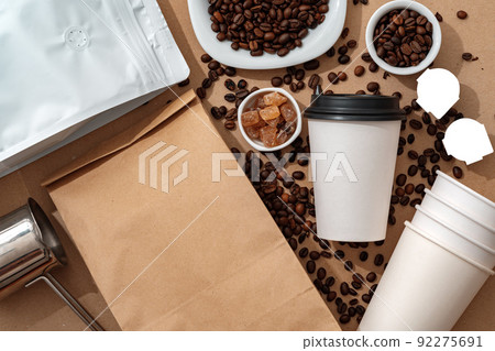 Blank brown kraft paper pouch bag with coffee beans and paper cup for your design Blank brown kraft paper pouch bag with coffee beans and paper cup for your design 92275691