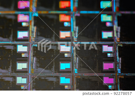 Silicon wafer with microchips used in electronics for the fabrication of integrated circuits. Full-frame high-tech macro background. 92278057