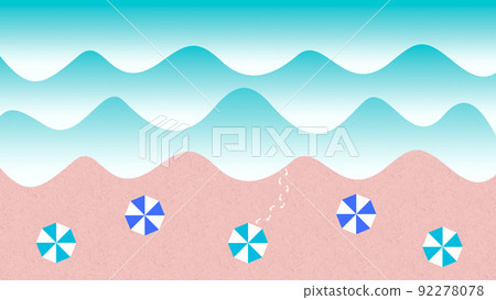 Beach umbrellas and footprints lined up on the sandy beach 92278078