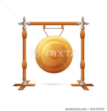 Golden gong on props. Vintage yellow metal disc suspended on poles 92278507