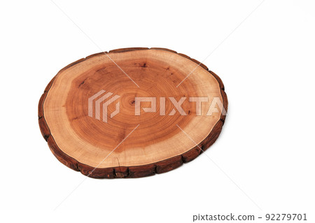 Wooden stand for a dish isolated on a white background. Tree trunk cut for product presentation demonstration Wooden stand for a dish isolated on a white background. Tree trunk cut for product presentation demonstration 92279701