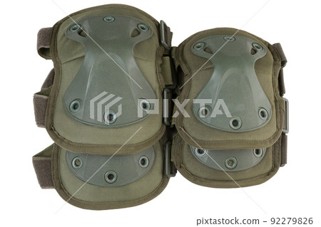 set of army knee pads and elbow pads in khaki color, lying one on top of the other, on a white background 92279826
