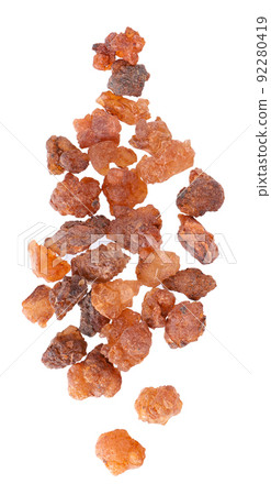 Myrrh resin isolated on white background. Pile of natural Commiphora myrrha. Sweet Myrrh Opoponax. Incense. Top view. 92280419
