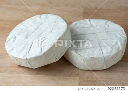Two Camembert cheese. Preparation for grilling 92282575