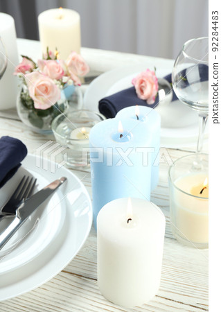 Concept of table setting with aroma candles 92284483