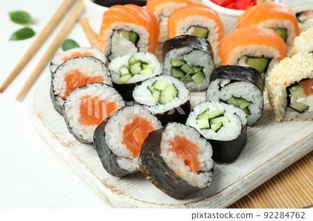 Concept of tasty food with sushi, close up Concept of tasty food with sushi, close up 92284762