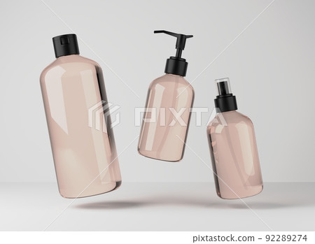 Three different beige glass bottles for hair and body care products 3D render, set of floating cosmetic containers on gray studio background, packaging mockup Three different beige glass bottles for hair and body care products 3D render, set of floating cosmetic containers on gray studio background, packaging mockup 92289274