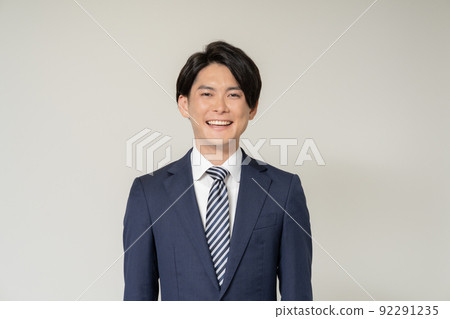Portrait of young businessman on white background 92291235