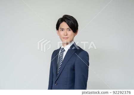 Portrait of young businessman on white background 92292376