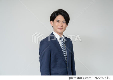 Portrait of young businessman on white background 92292610