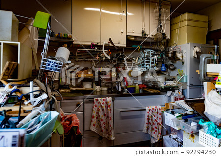 Dirty kitchen full of things, cluttered and unorganized 92294230