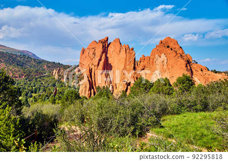 Landscape of desert plants and large pillars of red rock Landscape of desert plants and large pillars of red rock 92295818