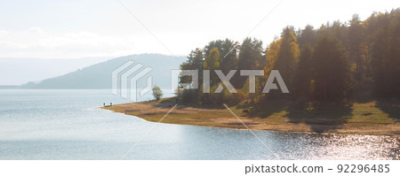 Batak Reservoir dam in autumn, Bulgaria banner view 92296485