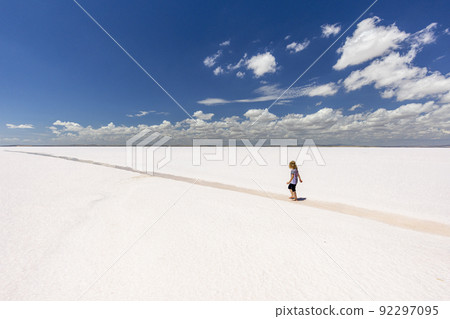 little girl walks on the tuz golu salt lake. little girl walks on the tuz golu salt lake. 92297095