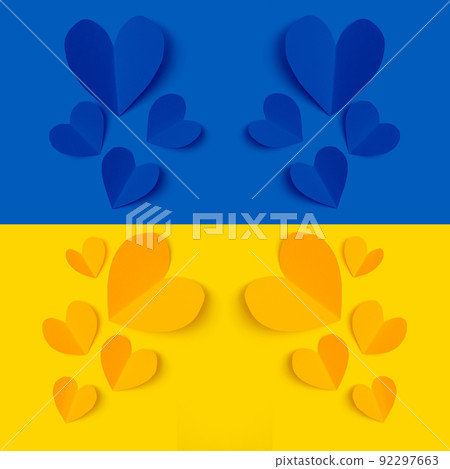 Stop war in Ukraine concept with heart and Ukrainian flag background Stop war in Ukraine concept with heart and Ukrainian flag background 92297663