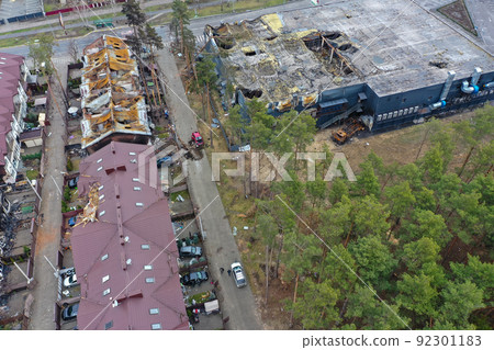 Hostomel, Kyev region Ukraine - 09.04.2022: Top view of the destroyed and burnt houses. Houses were destroyed by rockets or mines from Russian soldiers. Cities of Ukraine after the Russian occupation. Hostomel, Kyev region Ukraine - 09.04.2022: Top view of the destroyed and burnt houses. Houses were destroyed by rockets or mines from Russian soldiers. Cities of Ukraine after the Russian occupation. 92301183