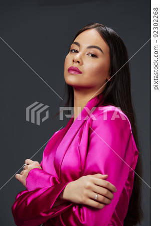 beautiful woman in pink dress fashion makeup glamor isolated background beautiful woman in pink dress fashion makeup glamor isolated background 92302268