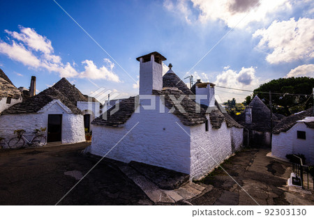 Famous Trulli houses in the city of Alberobello in Italy 92303130