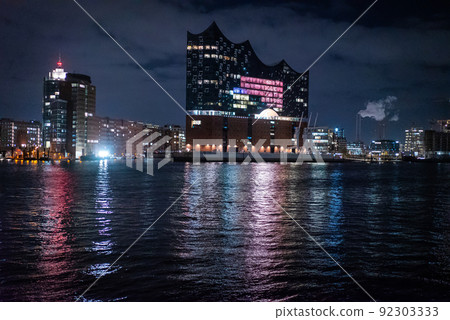 Beautiful harbour of Hamburg with Elbphilharmonie concert hall by night 92303333